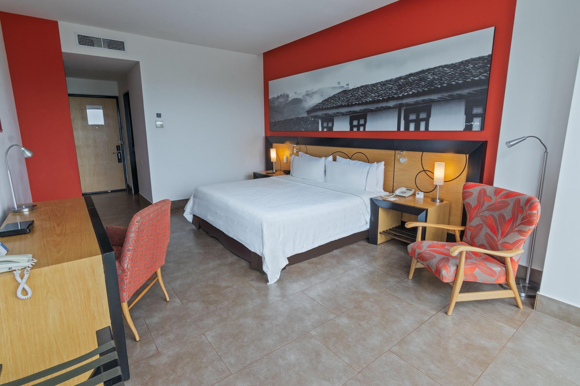 Sonesta Hotel Pereira Cerritos Exterior foto A room at the hotel